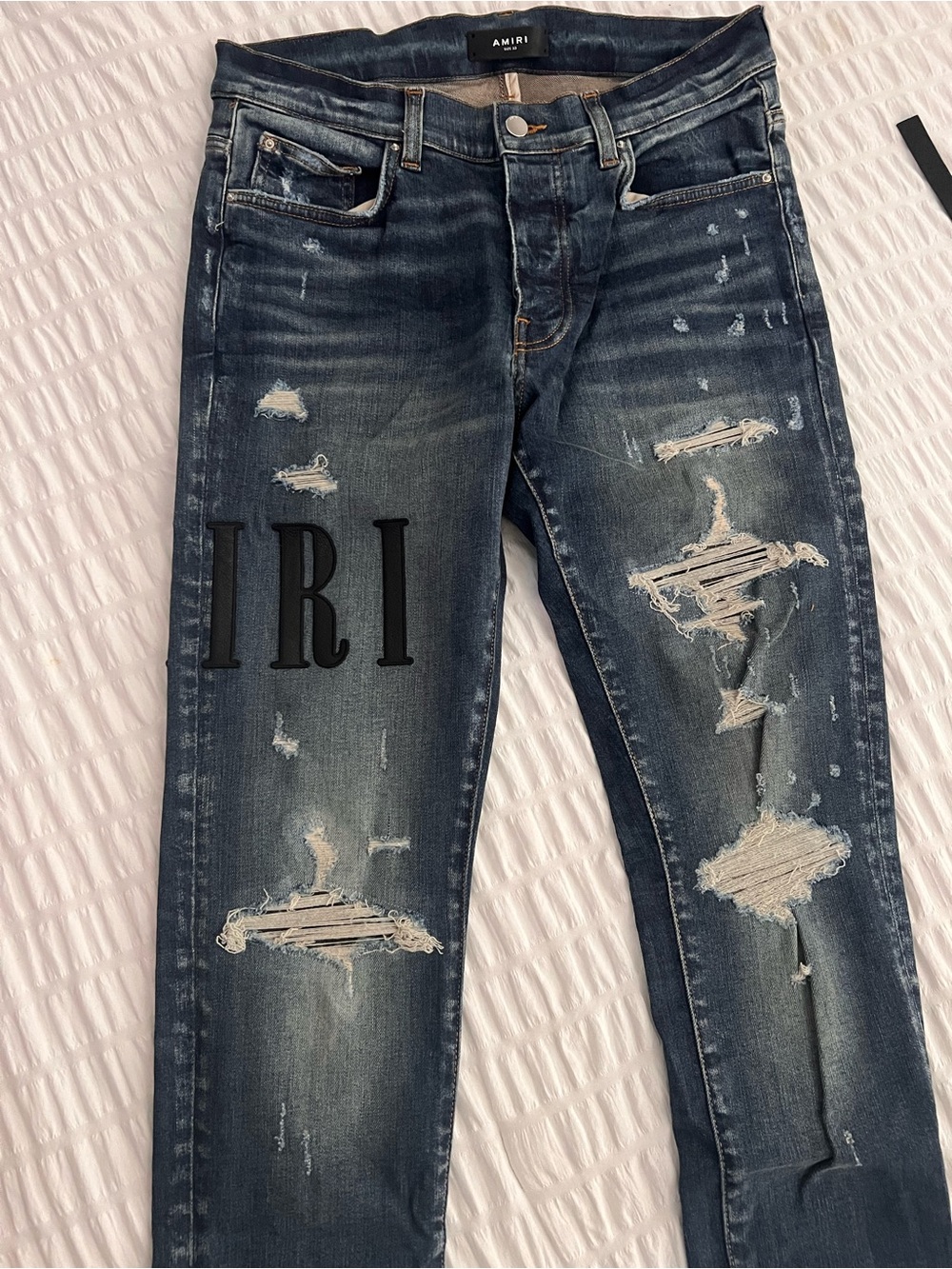 Men’s AMIRI Distressed Skinny Jeans in Dark Blue Wash